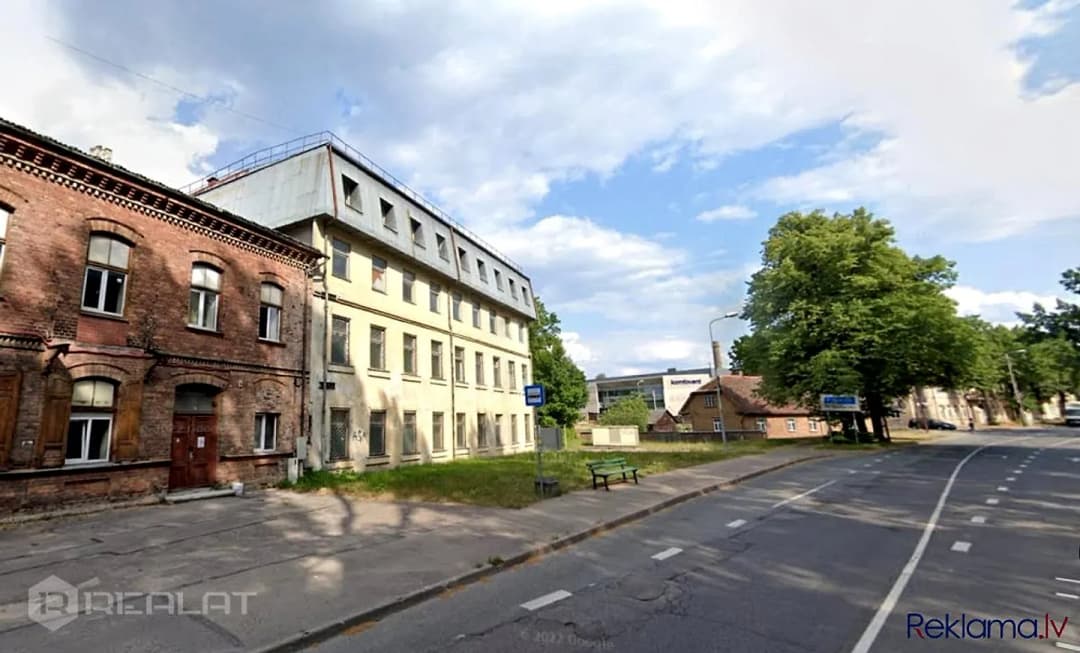 Pārdod pilnībā iznomātu dzīvokļu un komerctelpu namu aktīvā centrā daļā ar 8% — vēl bildes